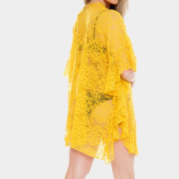 Ponchos/Coverups - Picture 2 of 10